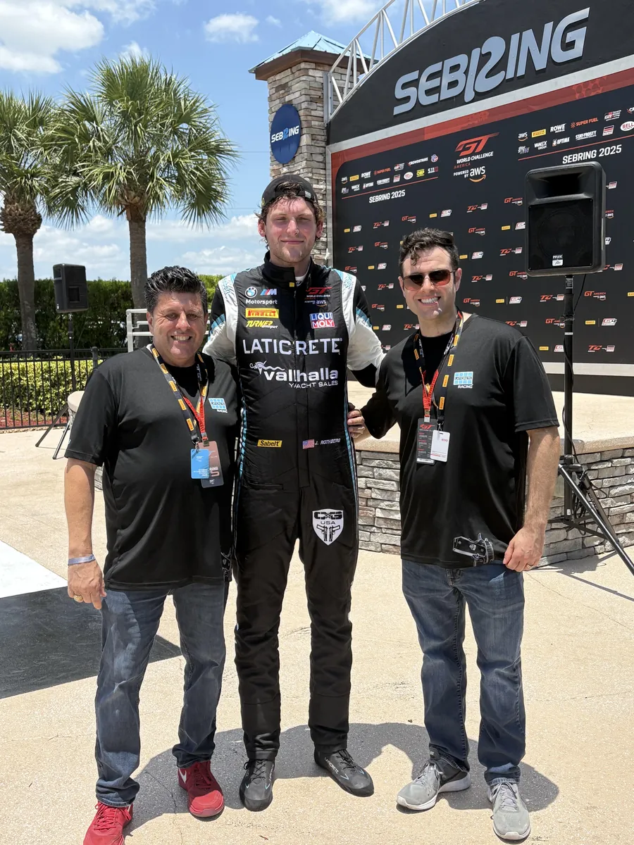 Laticrete Racing team and driver in Goldcoast Marketing Group custom team apparel at Sebring